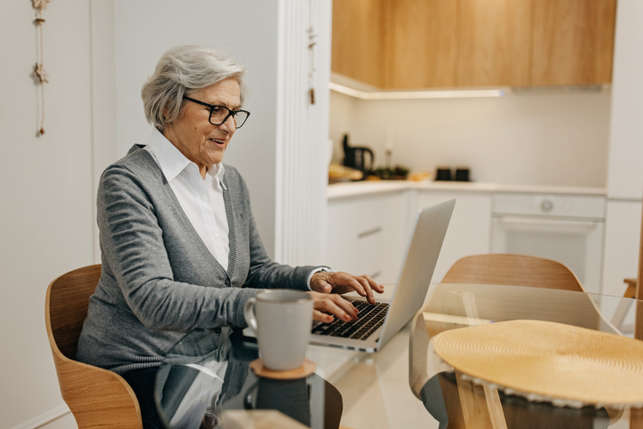 A senior reviewing her retirement plan.