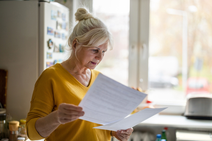 A senior reviewing her trust.